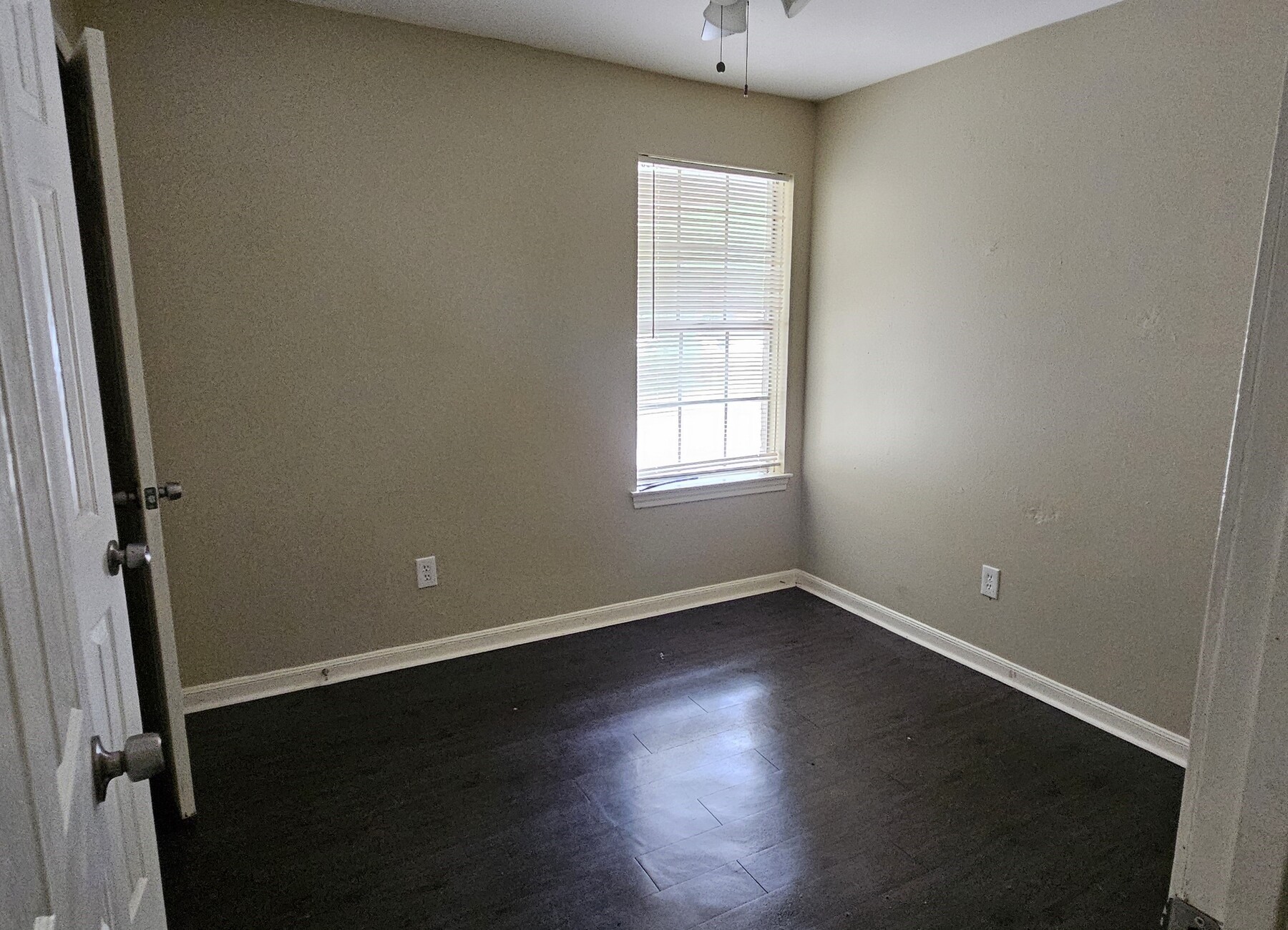 3303 Roaming Woods Lane Spring, TX 77380 - Photo 7 of 21 an empty room with wooden floor and windows