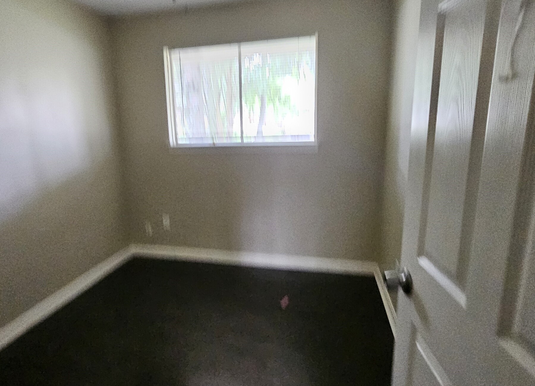 3303 Roaming Woods Lane Spring, TX 77380 - Photo 9 of 21 an empty room with wooden floor and windows