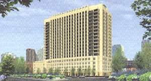 a front view of a building with a yard