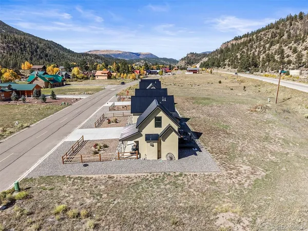 a view of a terrace with a lake