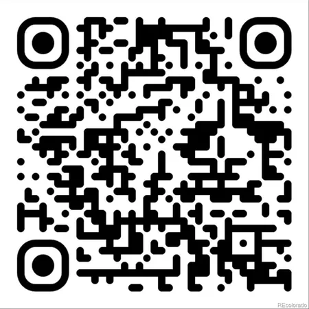 a bathroom with a black and white checkered floor