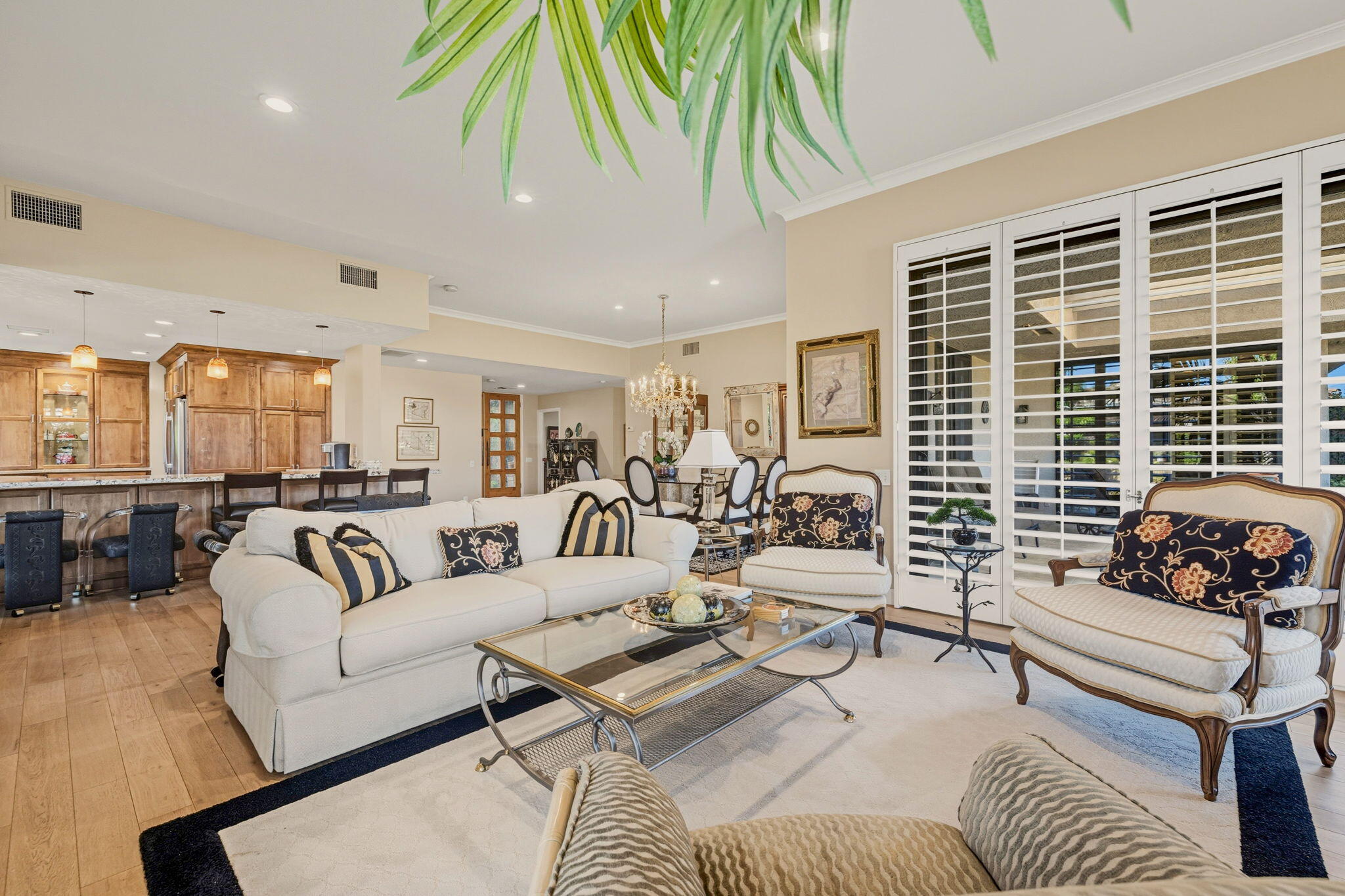 10 Whittier Court Rancho Mirage, CA 92270 - Photo 15 of 62 a living room with furniture and a large window