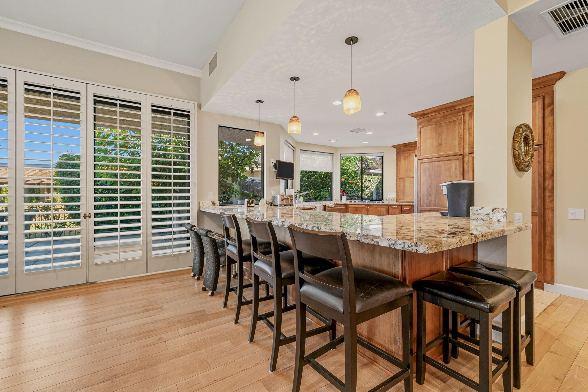 10 Whittier Court Rancho Mirage, CA 92270 - Photo 17 of 62 a dining room with furniture window and wooden floor