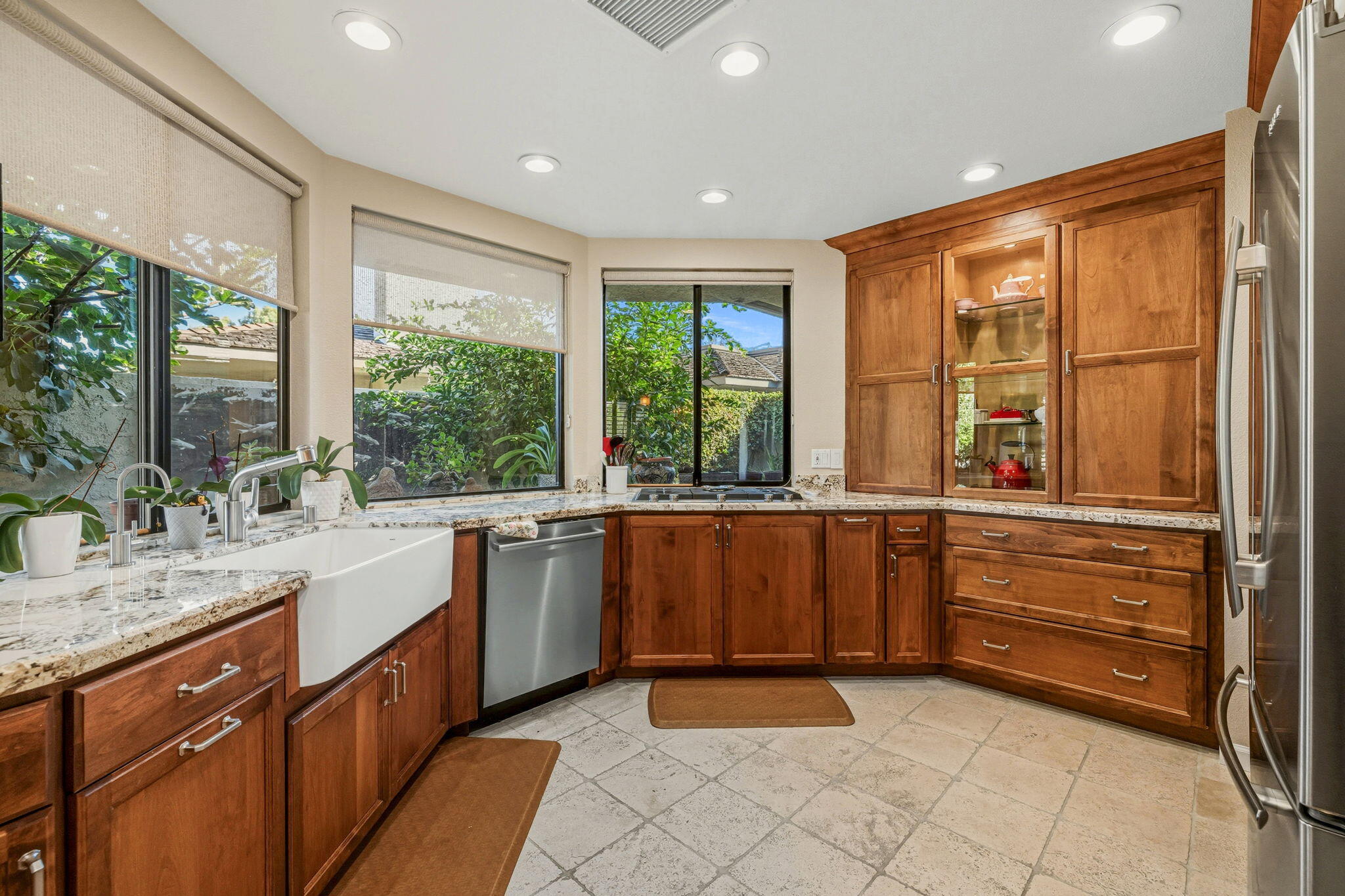 10 Whittier Court Rancho Mirage, CA 92270 - Photo 20 of 62 a kitchen with a sink and large window