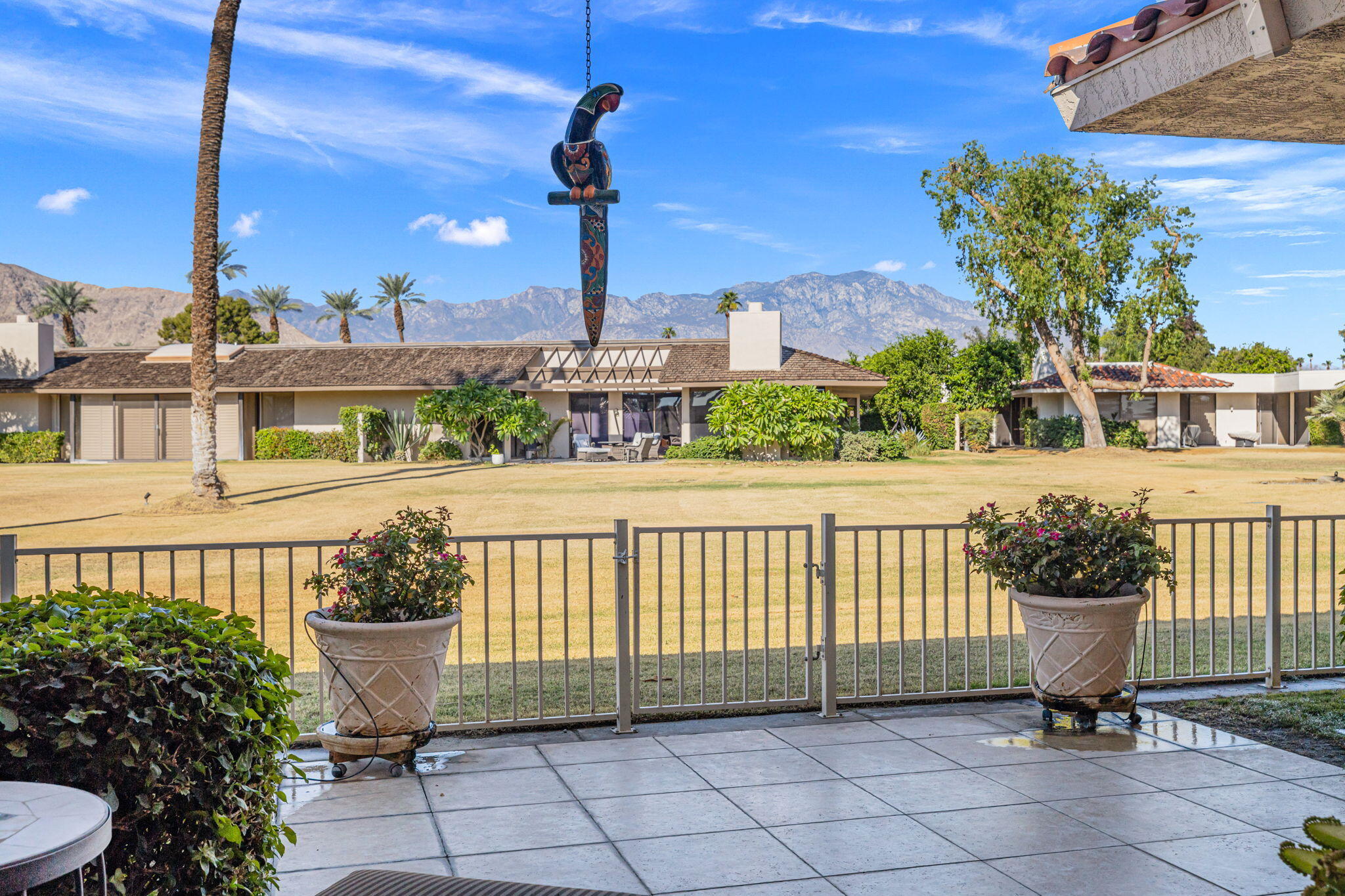 10 Whittier Court Rancho Mirage, CA 92270 - Photo 28 of 62 a view of a bench in patio of a house