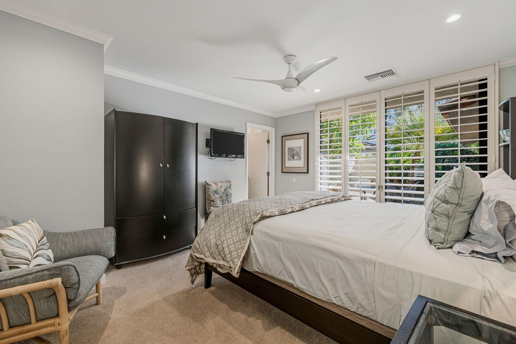 10 Whittier Court Rancho Mirage, CA 92270 - Photo 35 of 62 a bedroom with a bed and large window