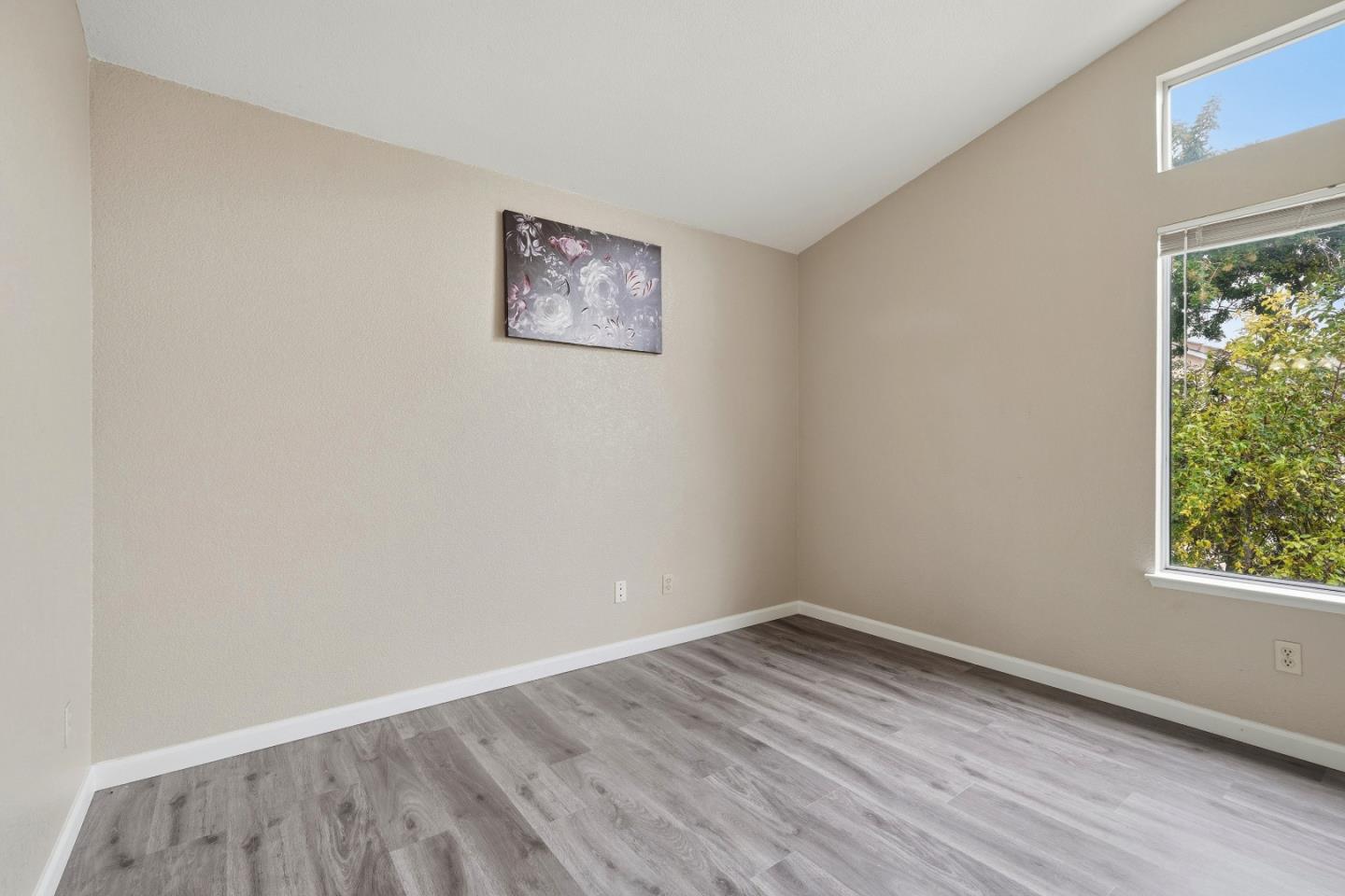 521 Leamon Street Tracy, CA 95376 - Photo 21 of 31 an empty room with a window