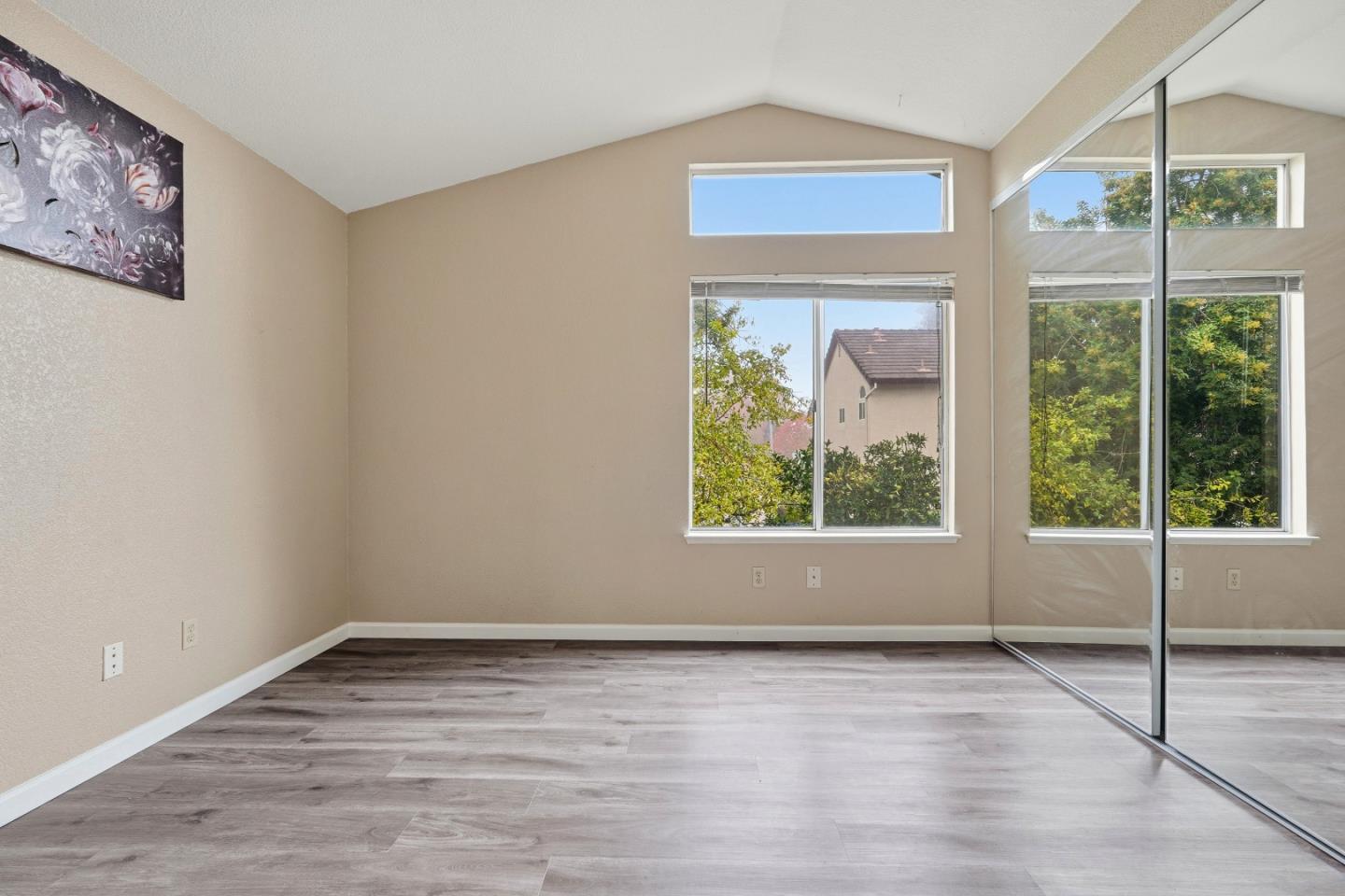 521 Leamon Street Tracy, CA 95376 - Photo 23 of 31 a view of empty room with wooden floor and fan