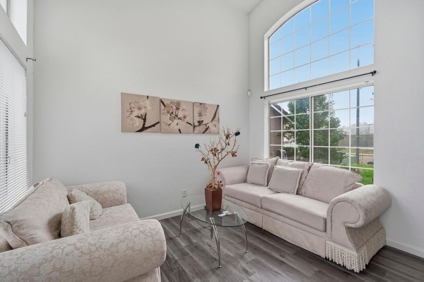 521 Leamon Street Tracy, CA 95376 - Photo 10 of 31 a living room with furniture and a large window