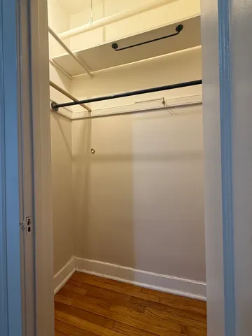 a view of small space with racks on the wall