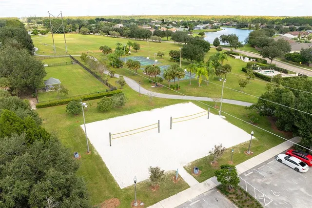 a view of a lake with a yard