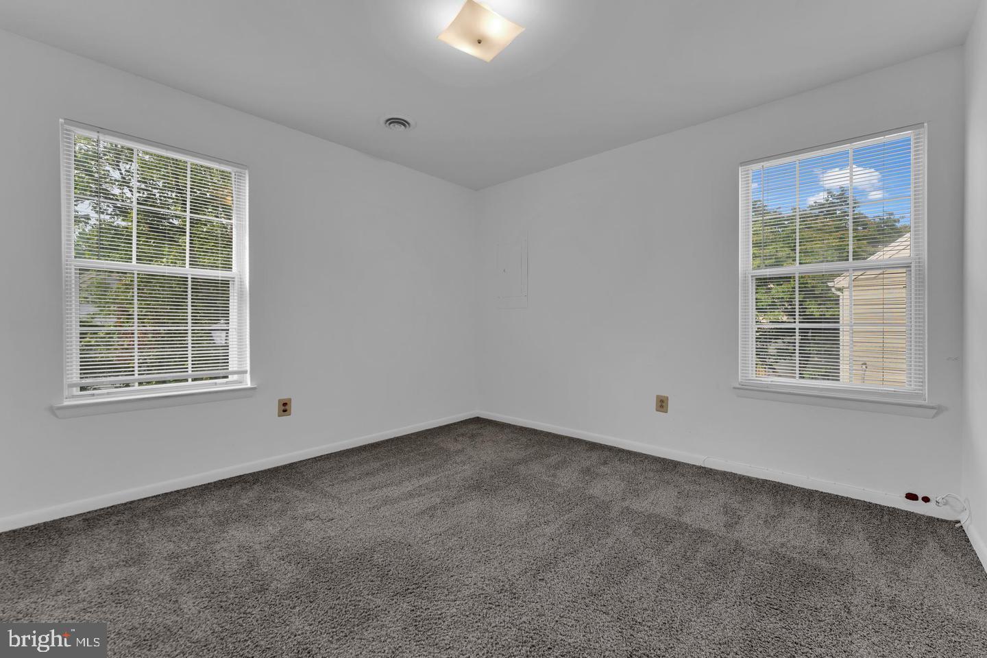 14314 Colonel Clagett Court, Unit 319 Upper Marlboro, MD 20772 - Photo 13 of 15 an empty room with a window