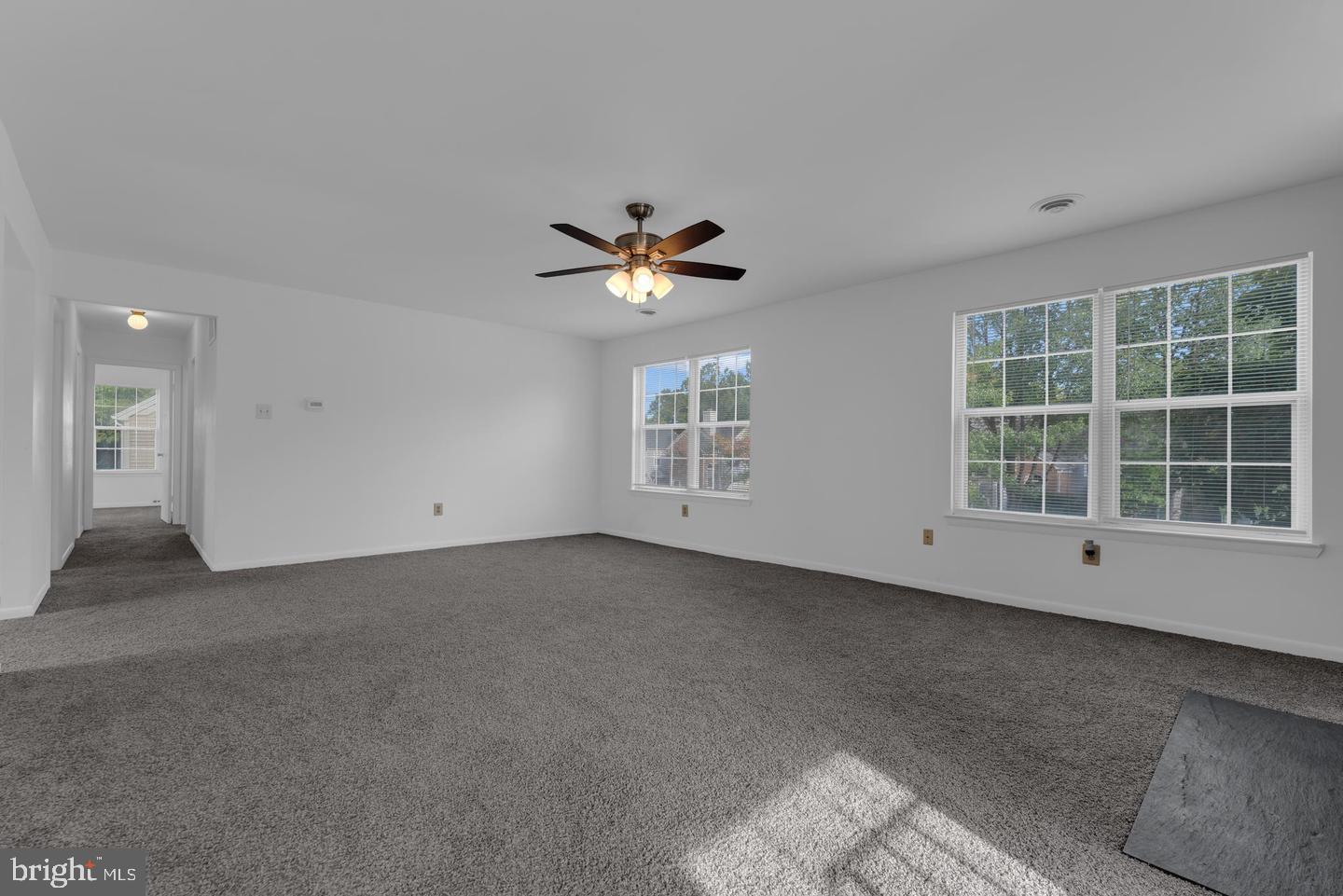 14314 Colonel Clagett Court, Unit 319 Upper Marlboro, MD 20772 - Photo 5 of 15 a view of an empty room with a window