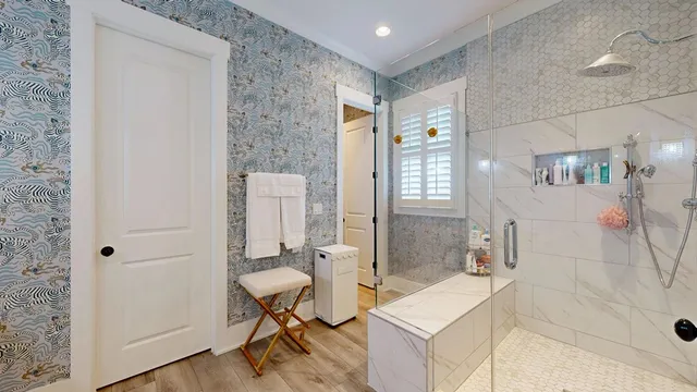 a bathroom with a bathtub and a sink