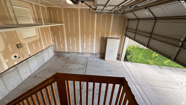 3547 East Golden Eagle Road Eagle Mountain, UT 84005 - Photo 36 of 47 Garage with a garage door opener