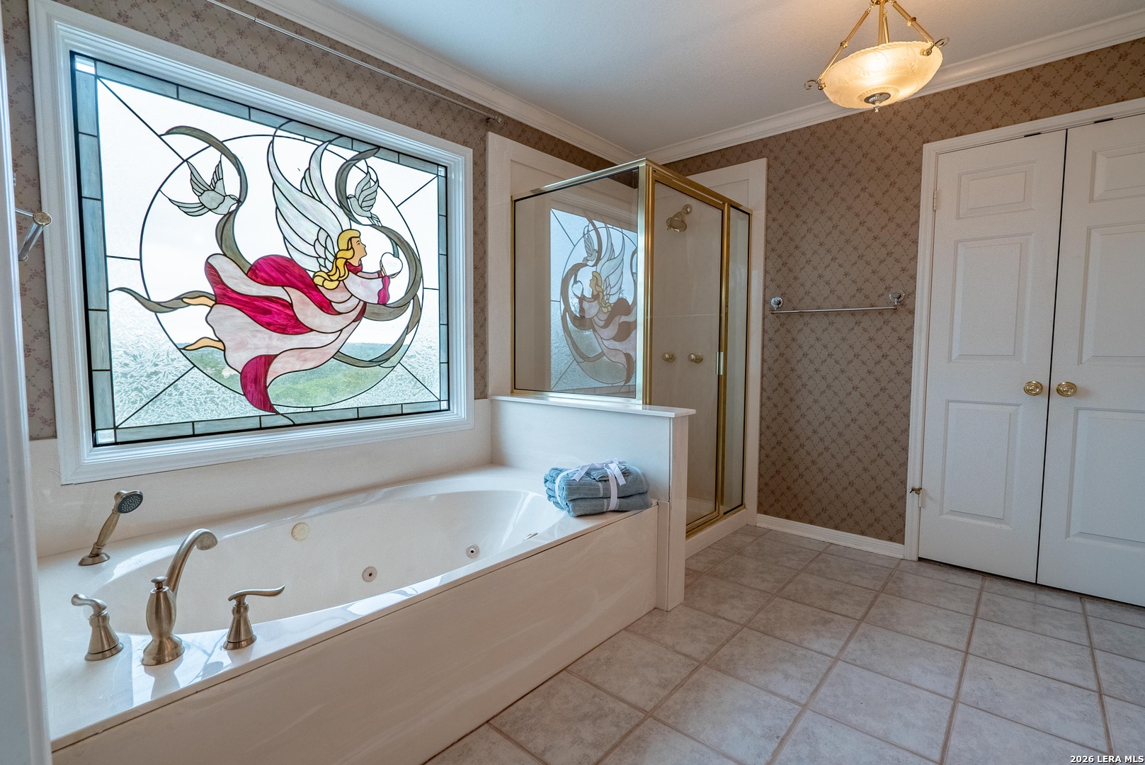 1985 State Loop 481 Junction, TX 76849 - Photo 28 of 37 a bathroom with a bathtub and a shower