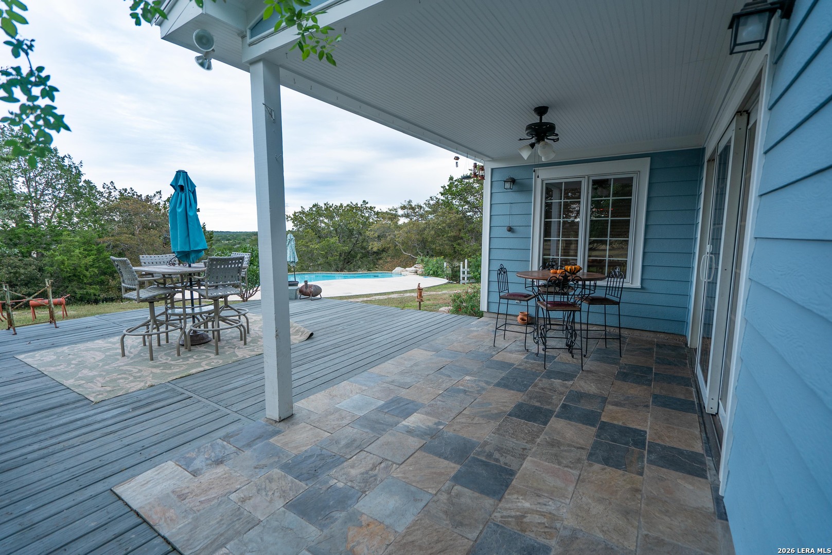 1985 State Loop 481 Junction, TX 76849 - Photo 34 of 37 a view of a patio with a table chairs and balcony
