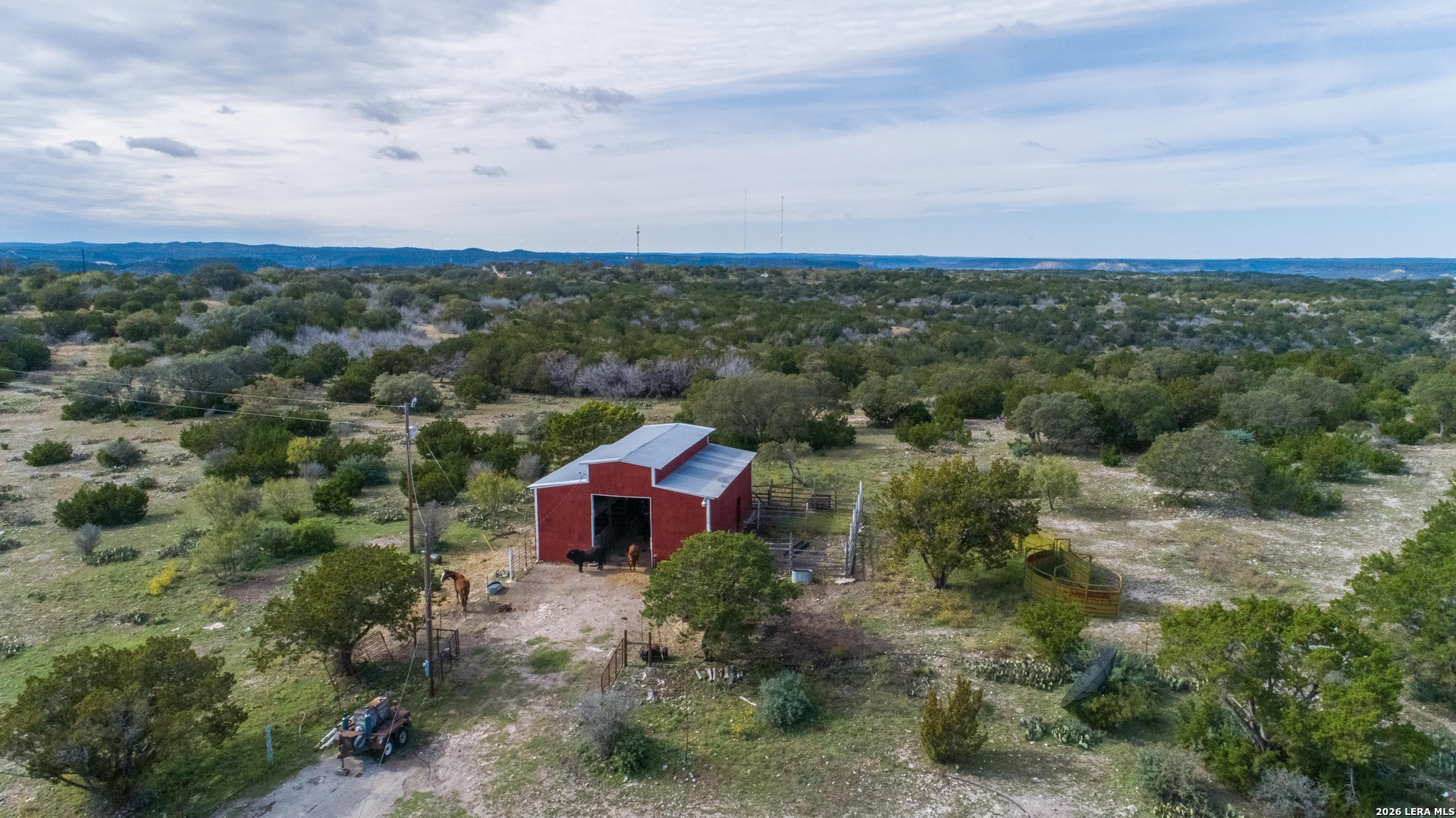 1985 State Loop 481 Junction, TX 76849 - Photo 7 of 37 a view of a city with lush green forest
