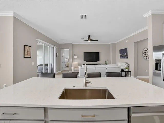 a spacious bathroom with a double vanity sink mirror and a bathtub