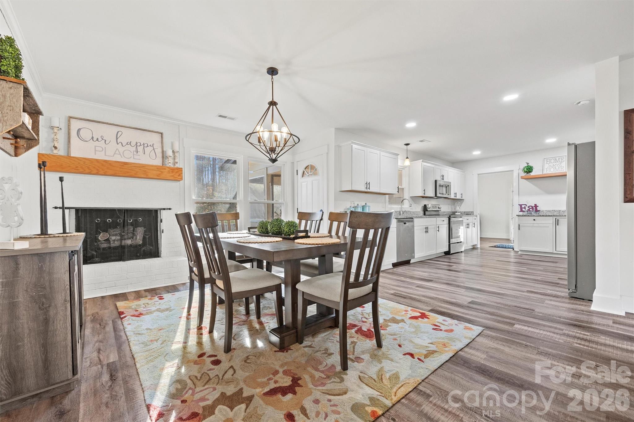 a view of a dining room with furniture