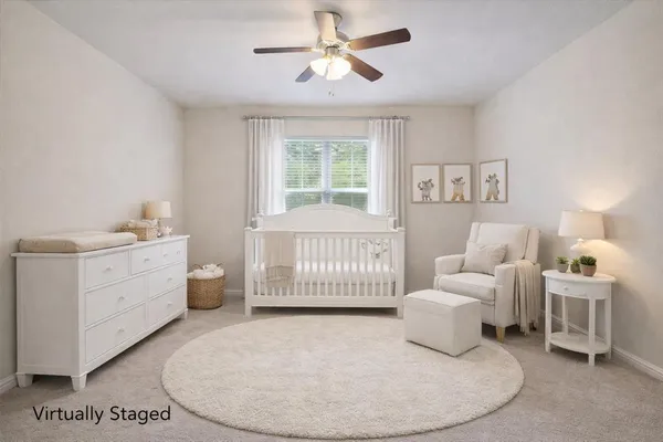 a bed room with a bed and a chandelier