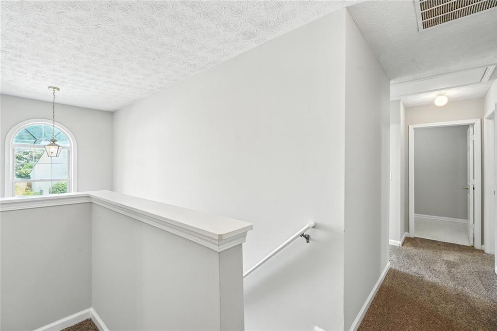 5487 Walnut Lane Lithonia, GA 30038 - Photo 26 of 43 wooden floor in an empty room