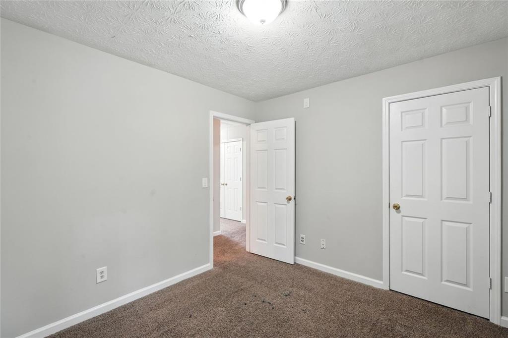 5487 Walnut Lane Lithonia, GA 30038 - Photo 28 of 43 a view of an empty room