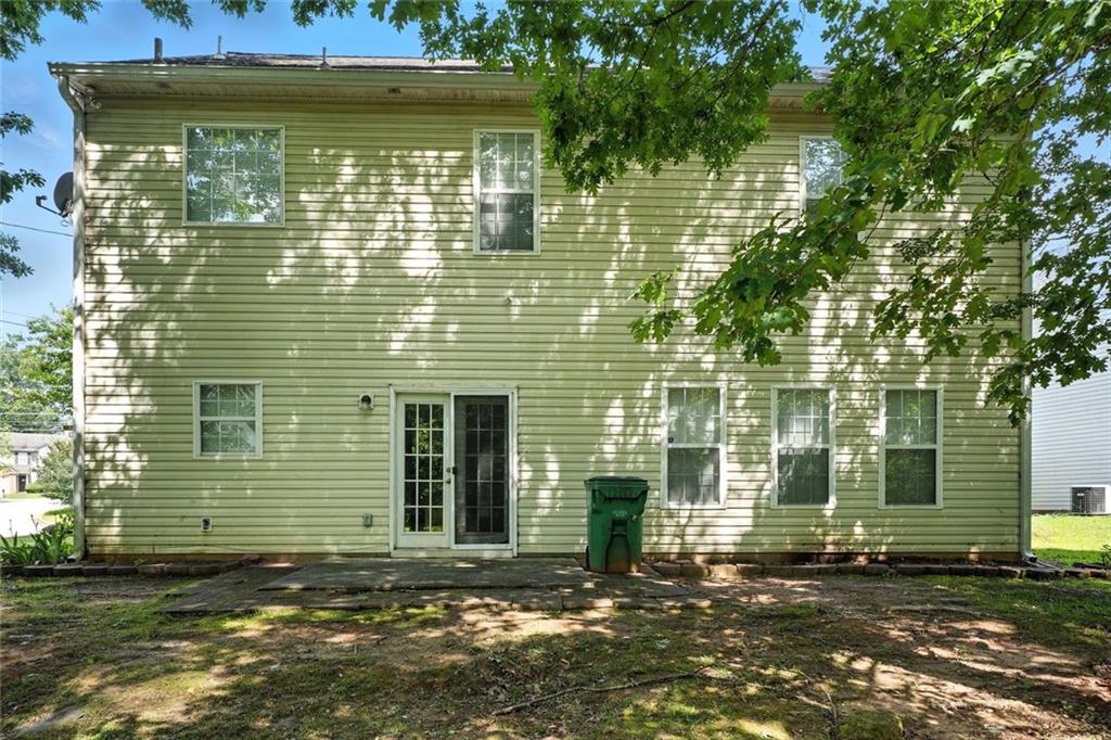 5487 Walnut Lane Lithonia, GA 30038 - Photo 42 of 43 a view of a house with a window