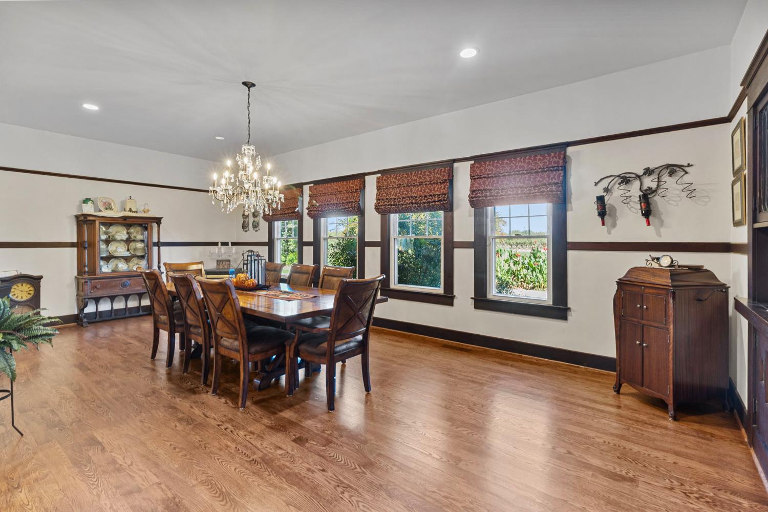 5237 Crows Landing Road Modesto, CA 95358 - Photo 16 of 87 a view of a dining room with furniture window and wooden floor