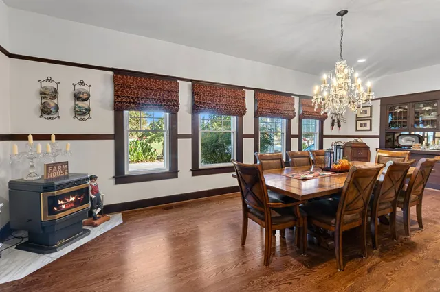 a kitchen with granite countertop a sink cabinets and stainless steel appliances