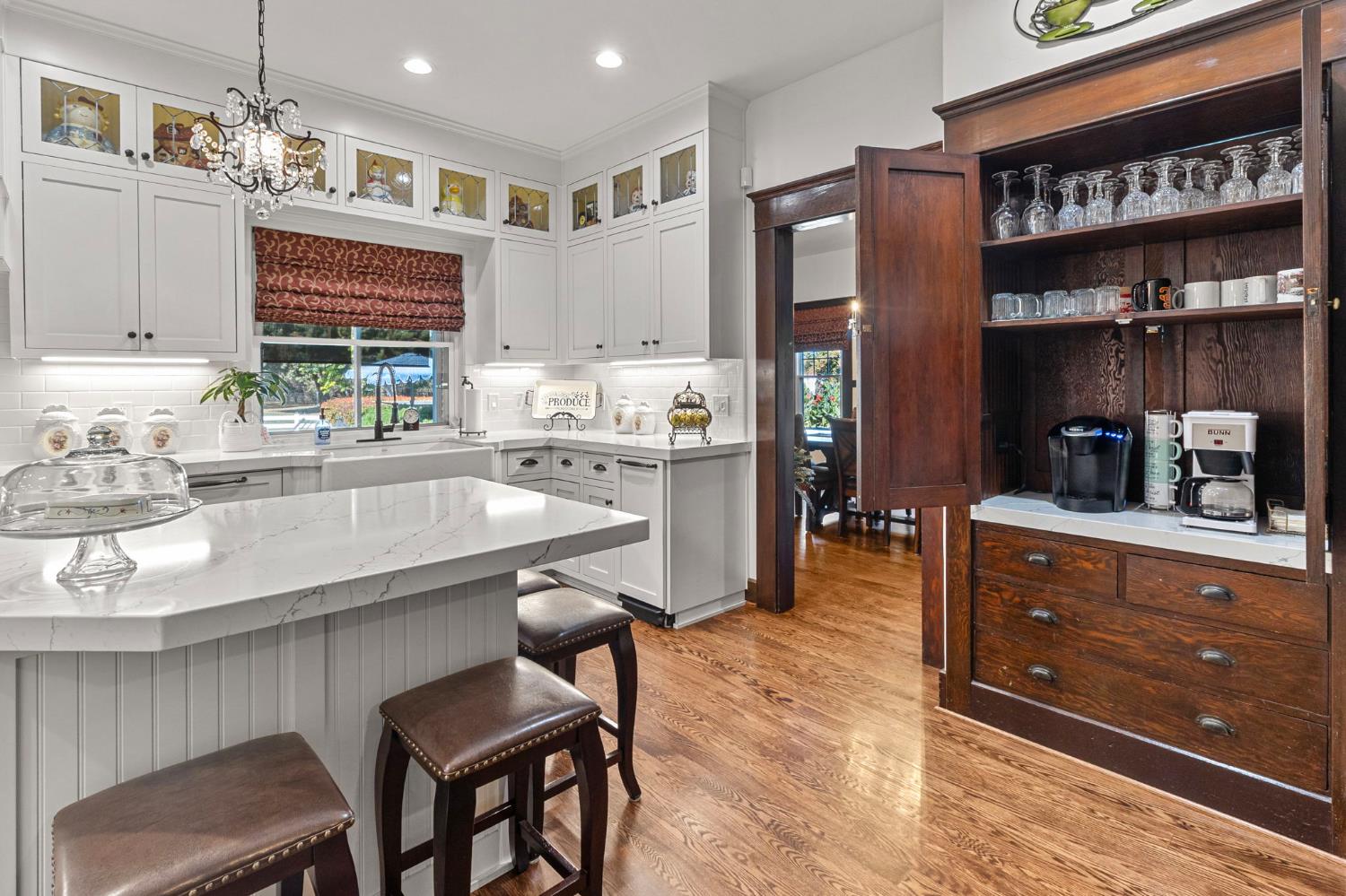 5237 Crows Landing Road Modesto, CA 95358 - Photo 20 of 87 a kitchen with granite countertop a sink cabinets and stainless steel appliances