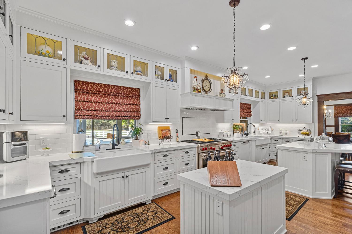 5237 Crows Landing Road Modesto, CA 95358 - Photo 23 of 87 a kitchen with stainless steel appliances a sink stove and cabinets