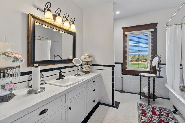 swimming pool view with a seating space