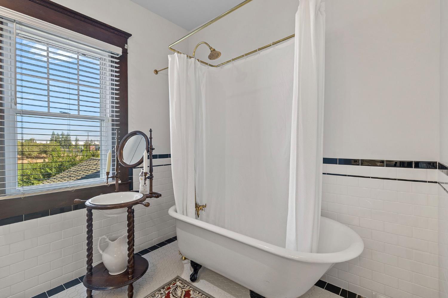 5237 Crows Landing Road Modesto, CA 95358 - Photo 35 of 87 a bathroom with a sink toilet and shower