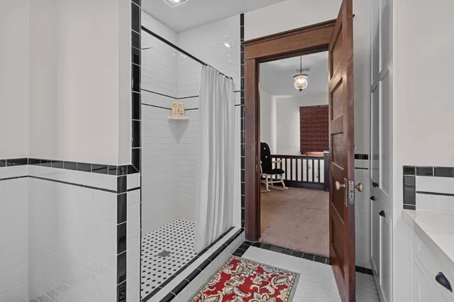 a building outdoor space with patio furniture and potted plants