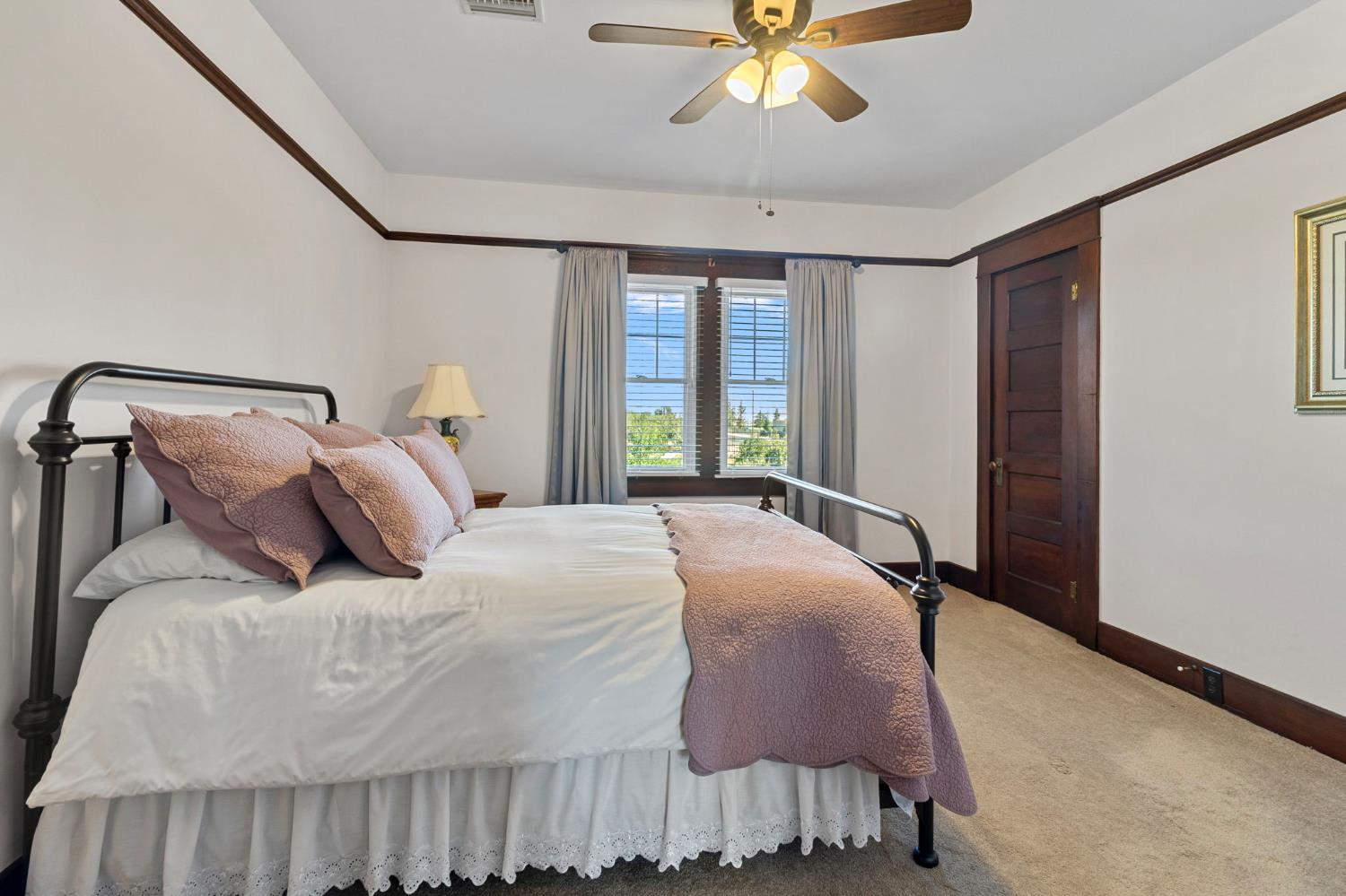 5237 Crows Landing Road Modesto, CA 95358 - Photo 42 of 87 a bedroom with a bed and window