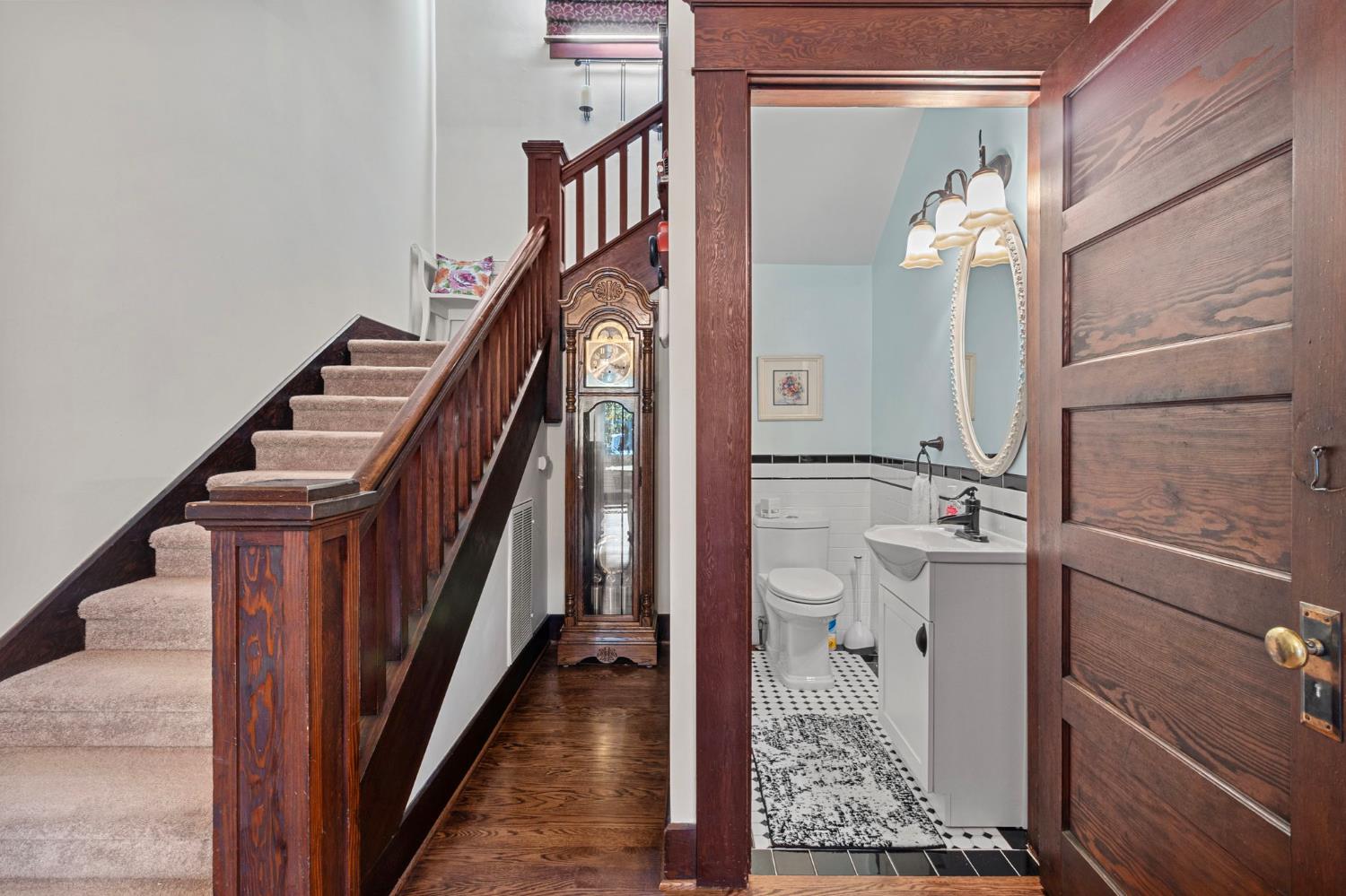 5237 Crows Landing Road Modesto, CA 95358 - Photo 44 of 87 a view of a hallway with wooden floor and staircase