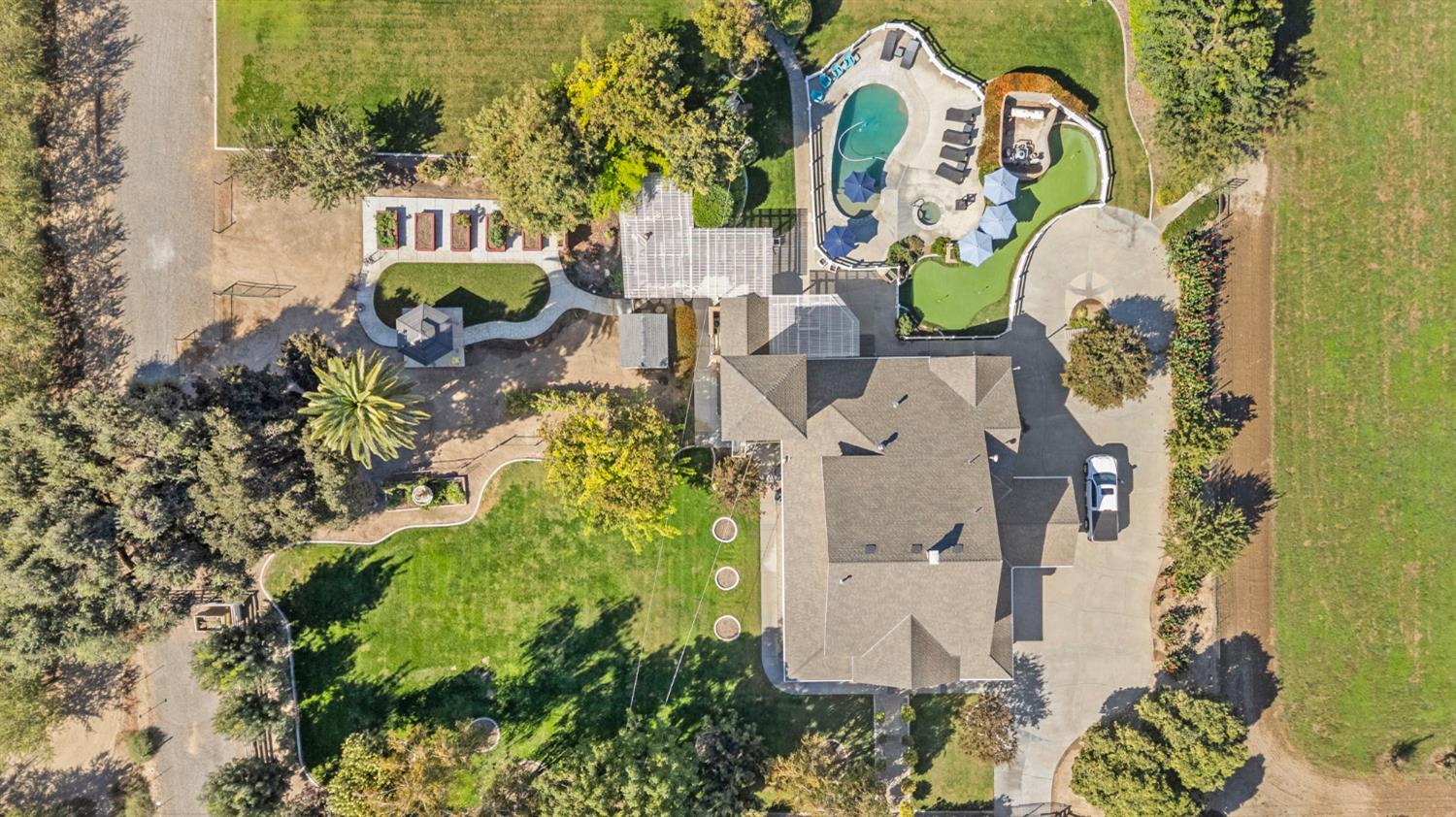 5237 Crows Landing Road Modesto, CA 95358 - Photo 6 of 87 an aerial view of a house with outdoor space