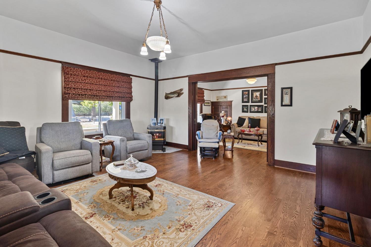 5237 Crows Landing Road Modesto, CA 95358 - Photo 9 of 87 a living room with furniture a table and a large window
