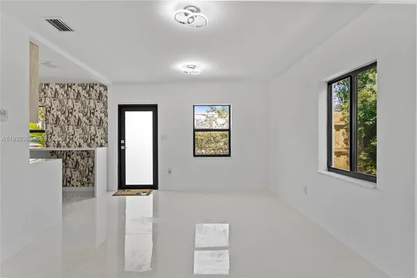 a view of elevator with hallway