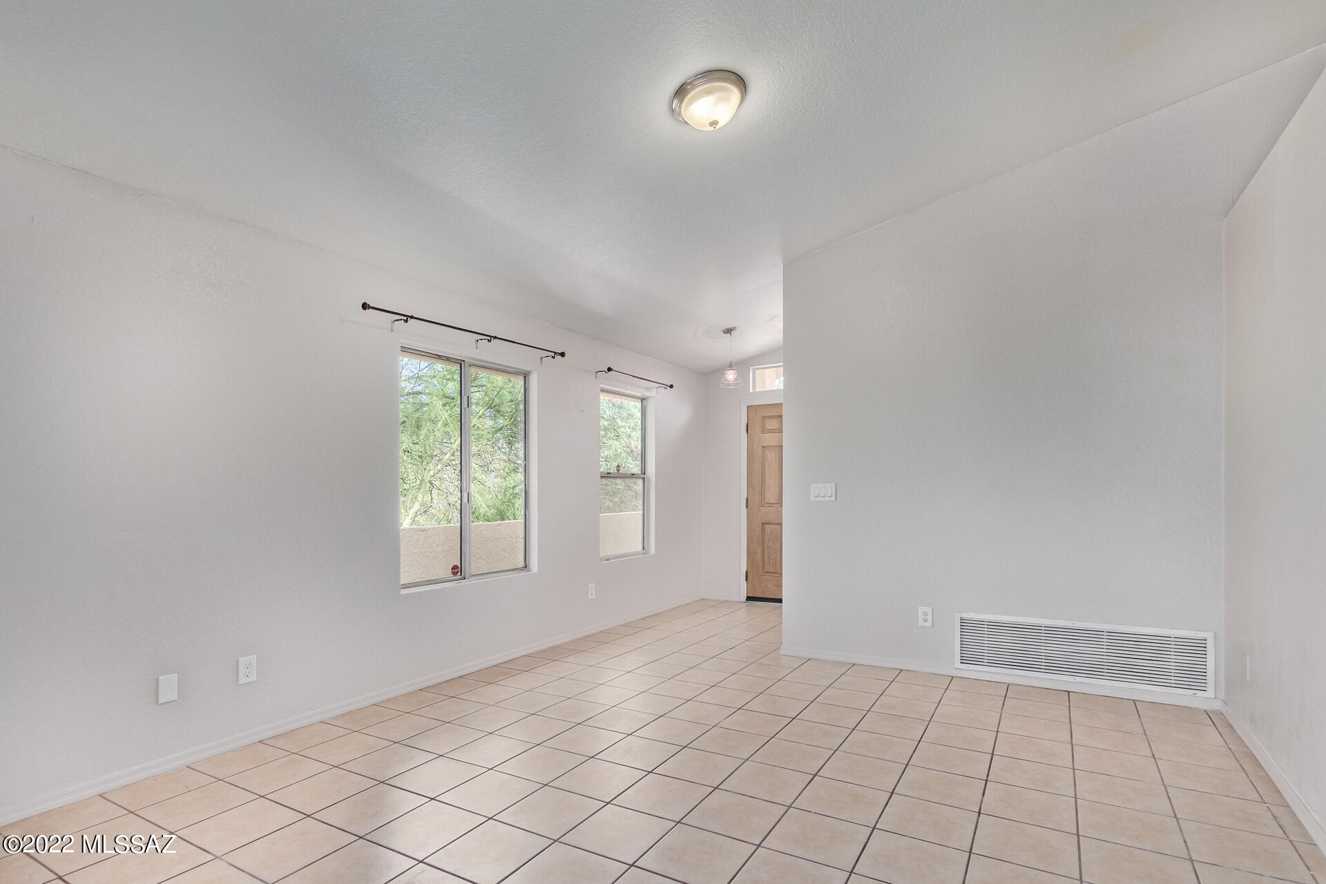 4697 West Weathervane Street Tucson, AZ 85741 - Photo 6 of 25 an empty room with windows