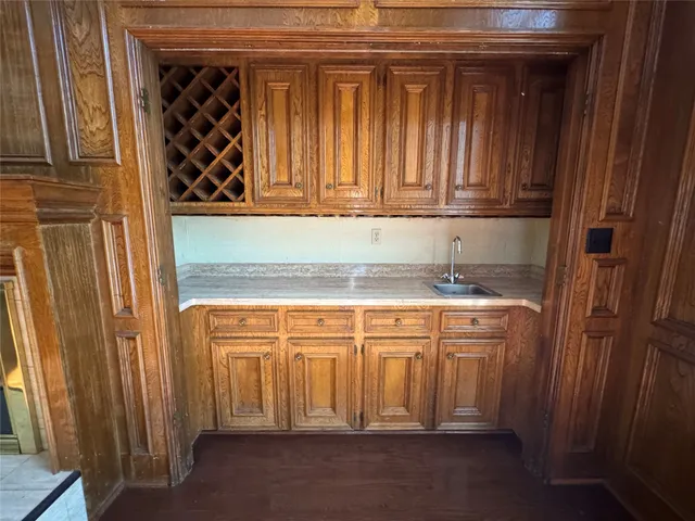 a view of balcony with wooden floor