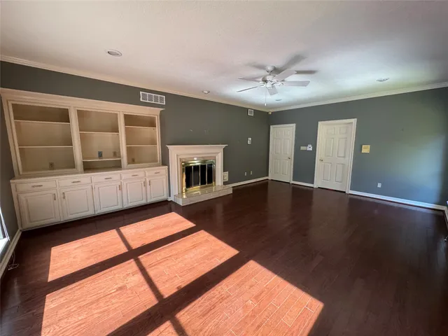 a view of a kitchen with a sink and a stove