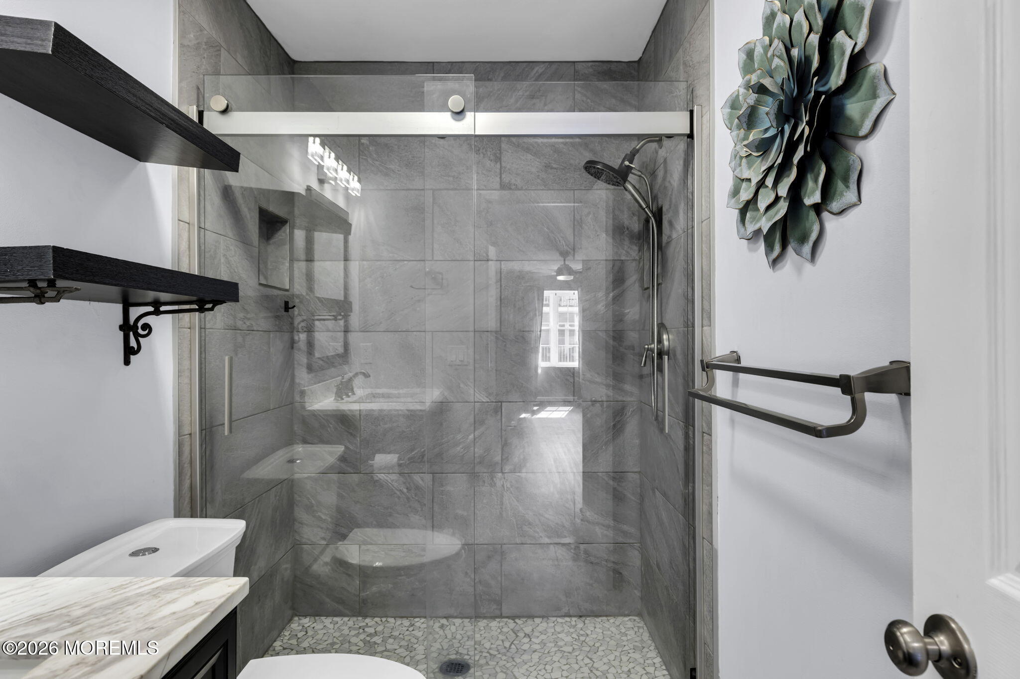 231 Atlantic Street, Unit 55 Keyport, NJ 07735 - Photo 18 of 31 a bathroom with a shower and a toilet