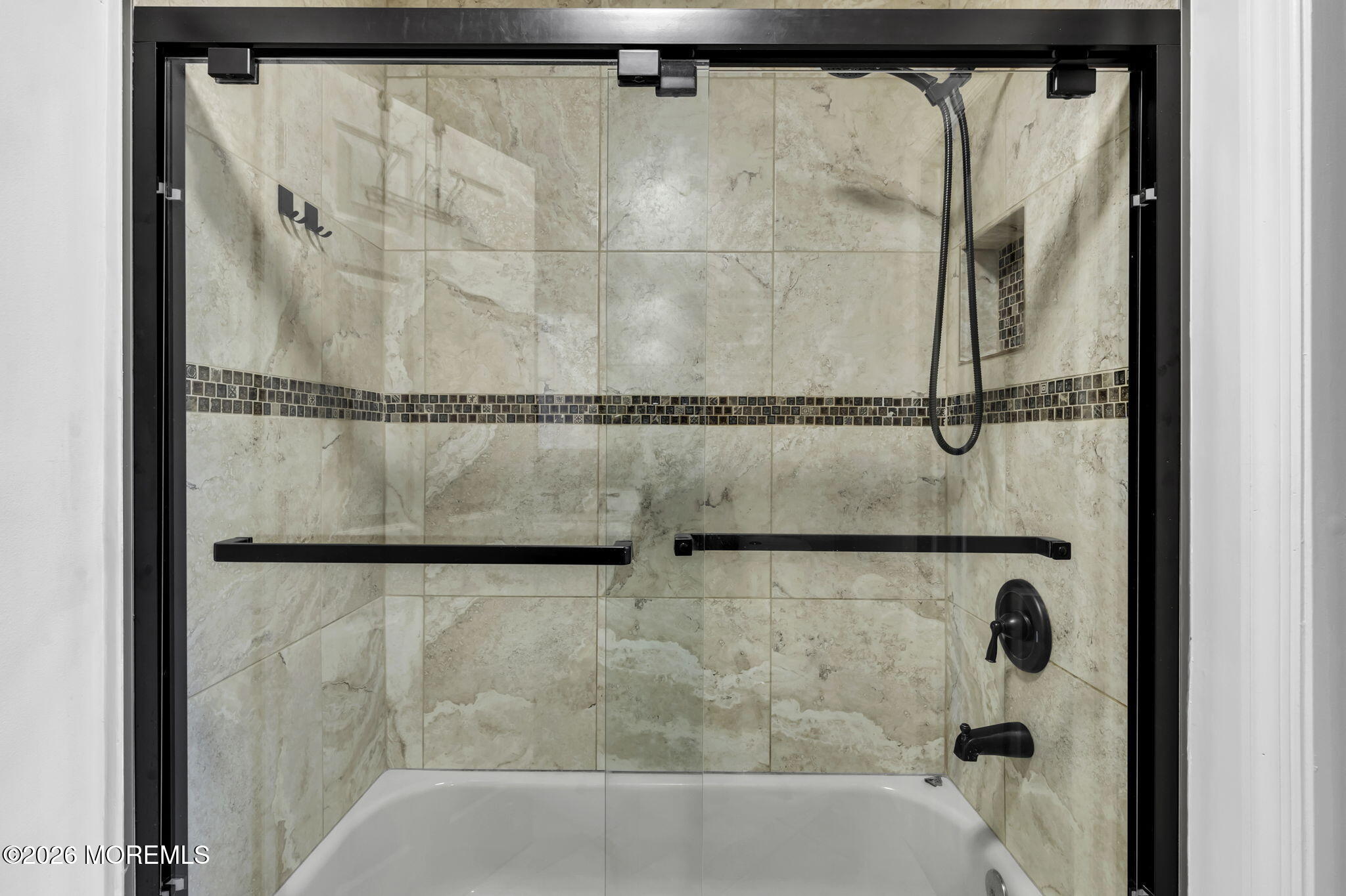 231 Atlantic Street, Unit 55 Keyport, NJ 07735 - Photo 23 of 31 a bathroom with a shower and a glass door