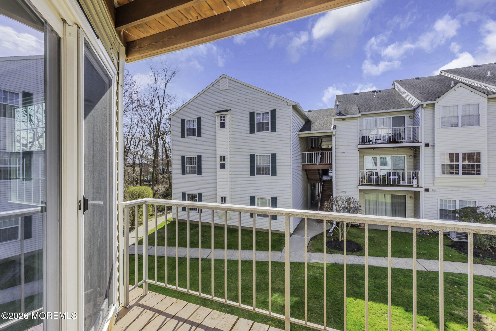 231 Atlantic Street, Unit 55 Keyport, NJ 07735 - Photo 28 of 31 a view of a large building from a balcony
