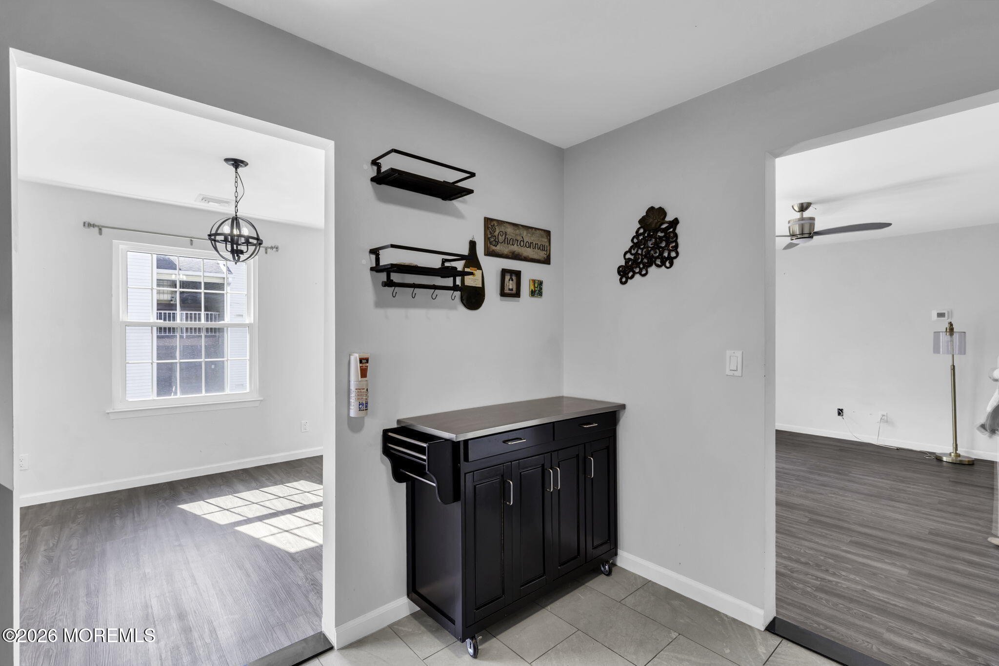 231 Atlantic Street, Unit 55 Keyport, NJ 07735 - Photo 5 of 31 a kitchen with a refrigerator and a stove top oven