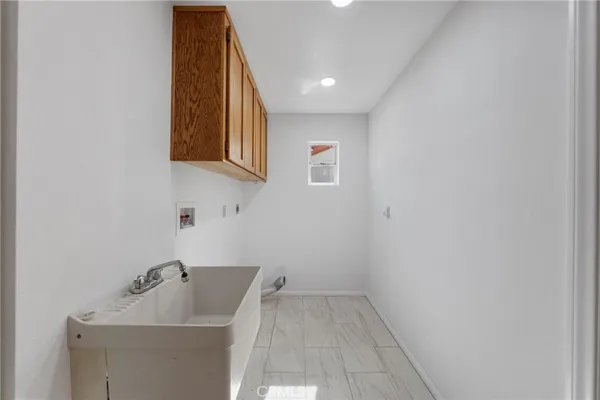 a bathroom with a sink and mirror