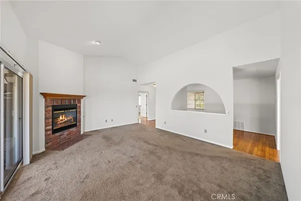 a view of a livingroom with a fireplace