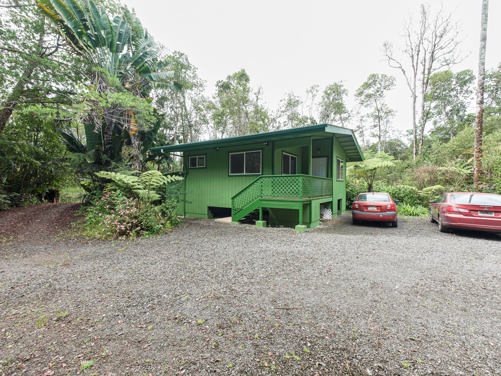 1 9th Street Mountain View, HI 96771 - Photo 20 of 21 a view of a car parked in front of a house
